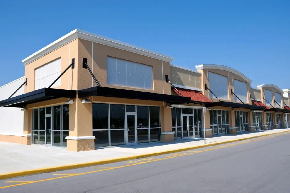 A large commercial building with many windows and doors.
