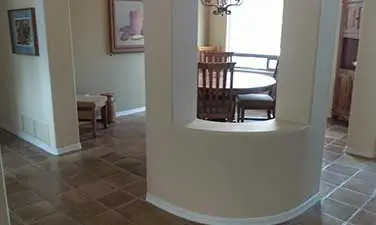 A room with chairs and tables in it